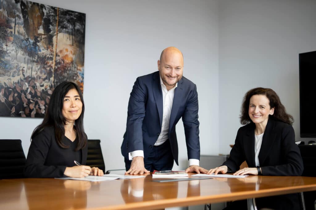 Stock Photography by hero shot photography - man smiling at desk