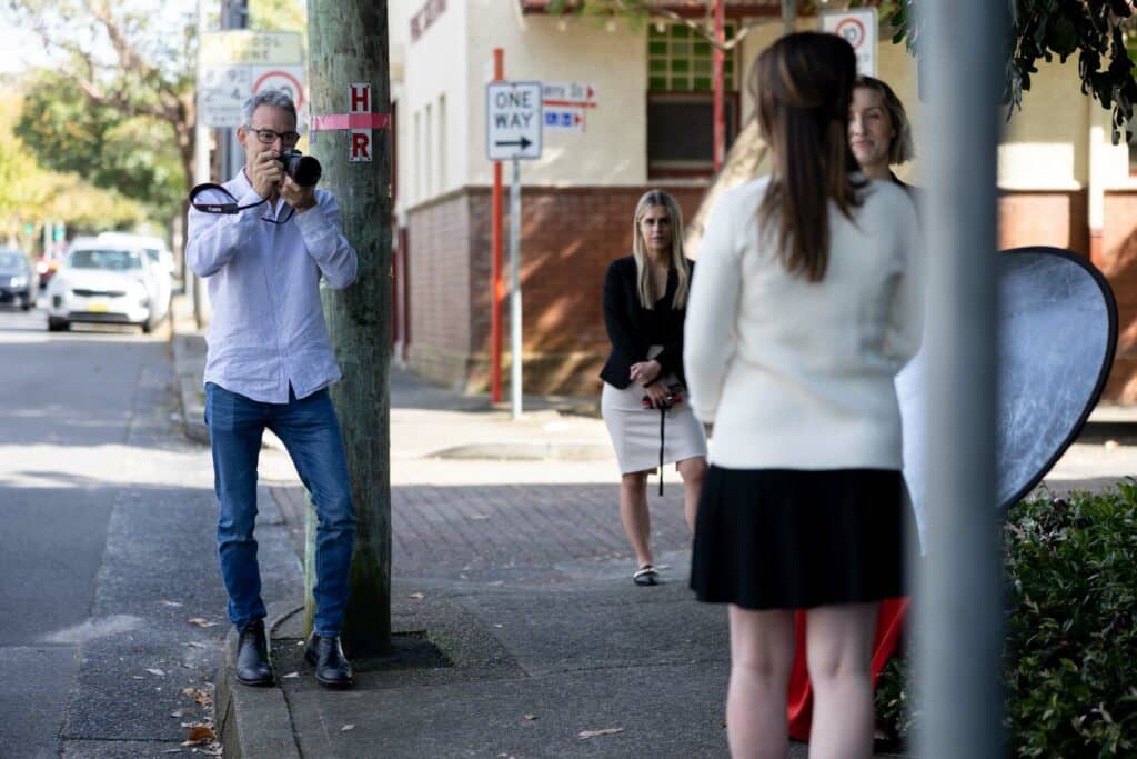 photographer taking portraits in the street in North Sydney