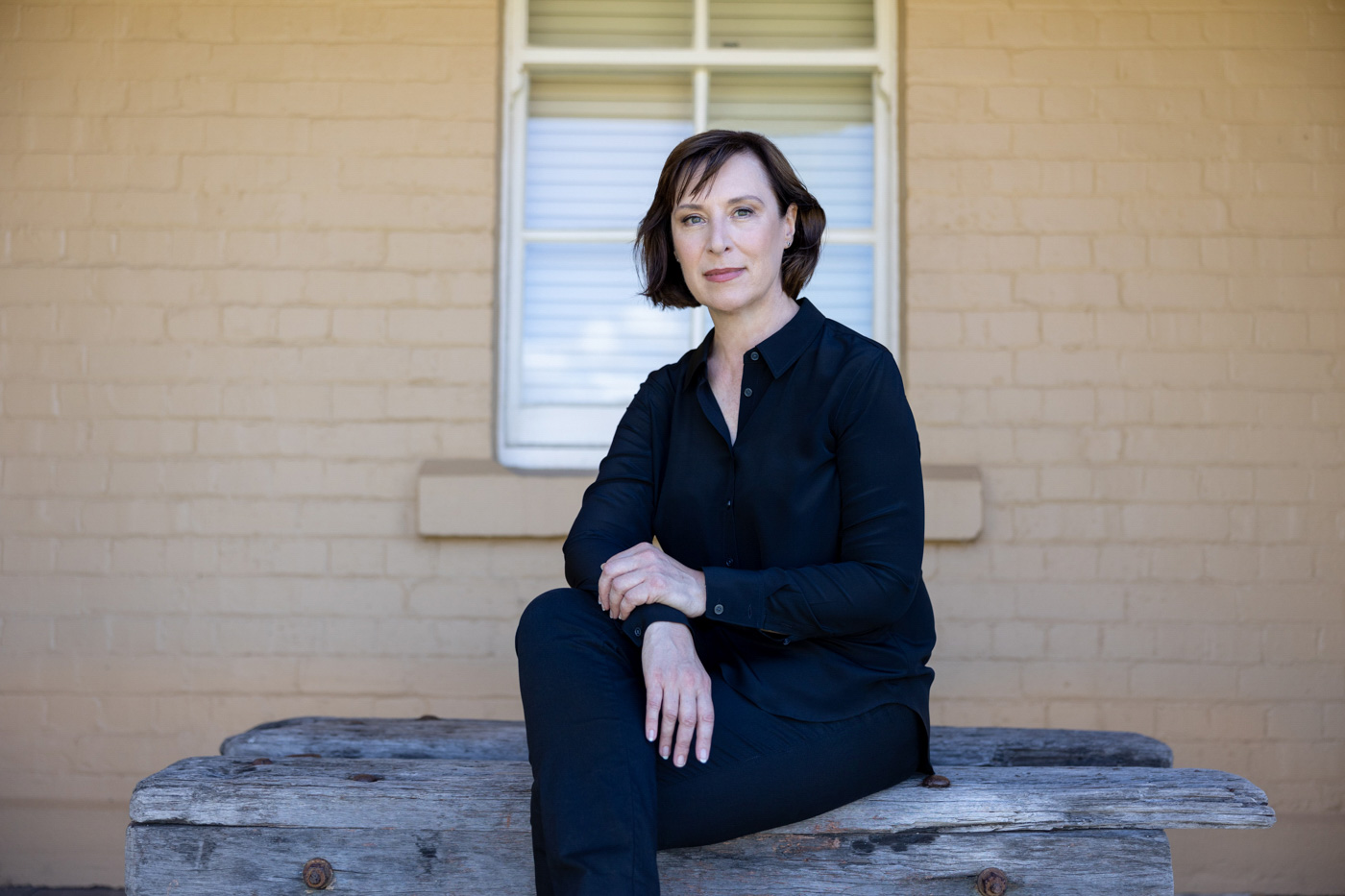 editorial portrait of woman seated